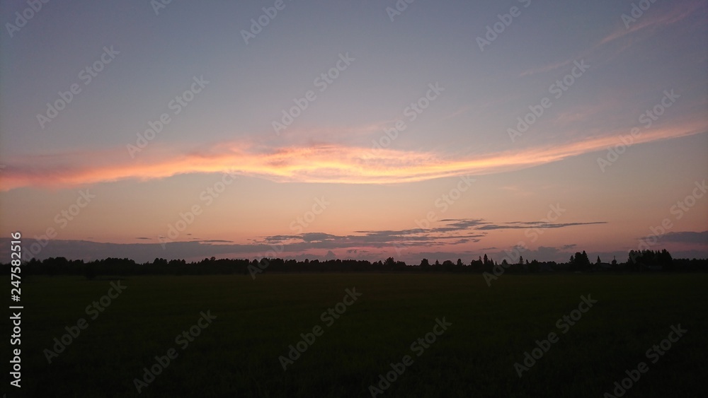 sunset over field sunset over field