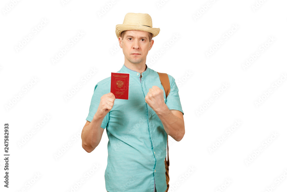 The man with the international passport to stand in a boxing pose, shakes a fist The man with the international passport to stand in a boxing pose, shakes a fist