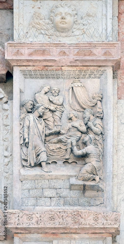 Jesus raised Lazarus by Casario, left door of San Petronio Basilica in Bologna, Italy