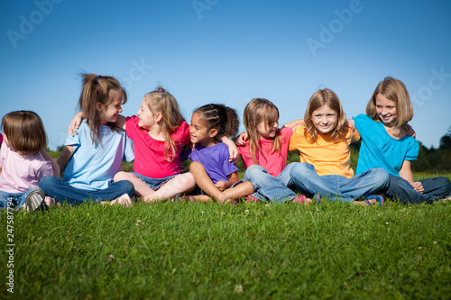 Group of Girls Sitting Together Outside - Unity, Friendship