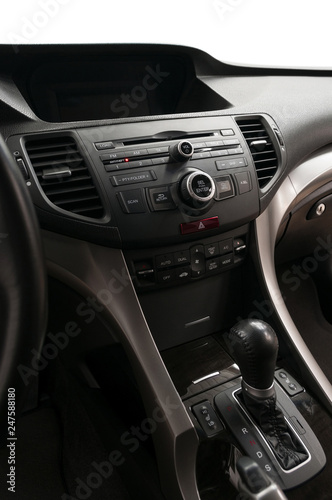 Panel of modern car. Auto interior detail. Vertical photo.