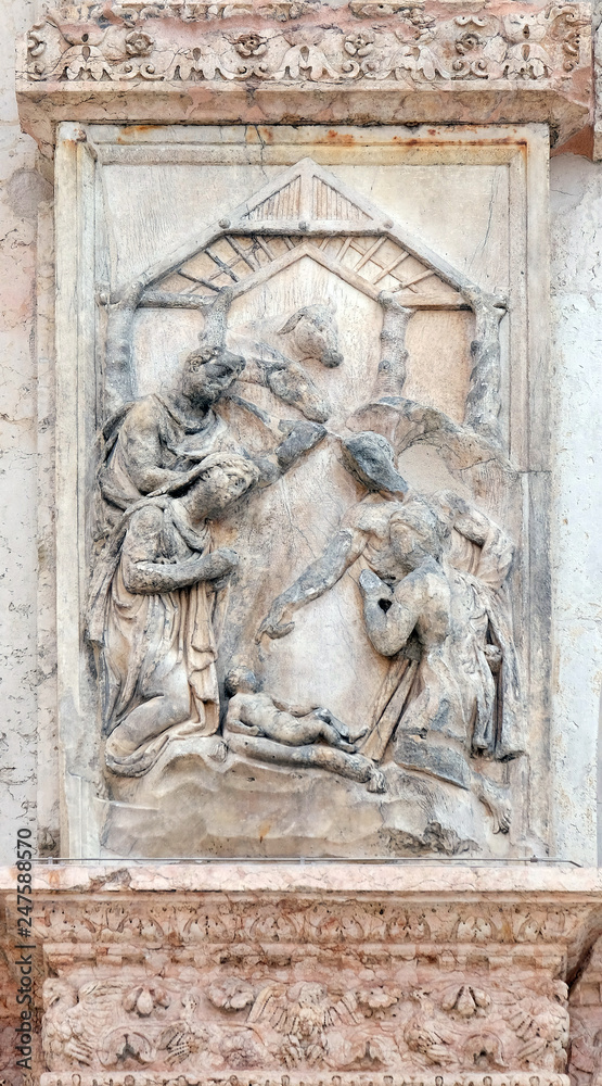 Nativity, Birth of Jesus, panel on the left door of San Petronio Basilica in Bologna, Italy