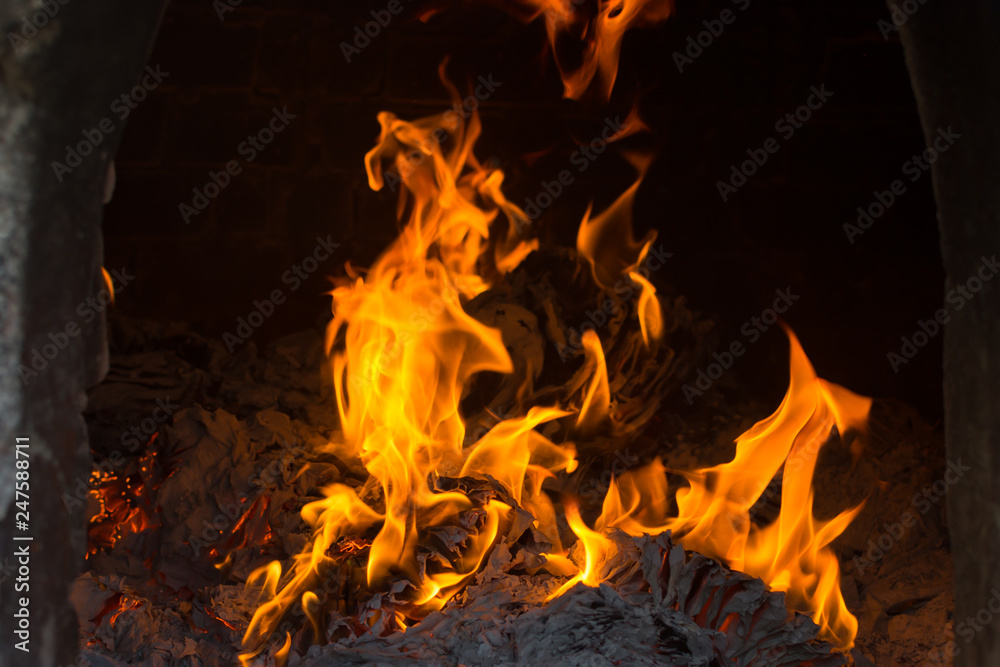 The flames are burning in the furnace. Blazing flames flare in the furnace. The flames are burning in the furnace. Blazing flames flare in the furnace.