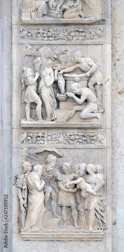 Stories of Rebecca up and Moses by Alfonso Lombardi, left door of San Petronio Basilica in Bologna, Italy