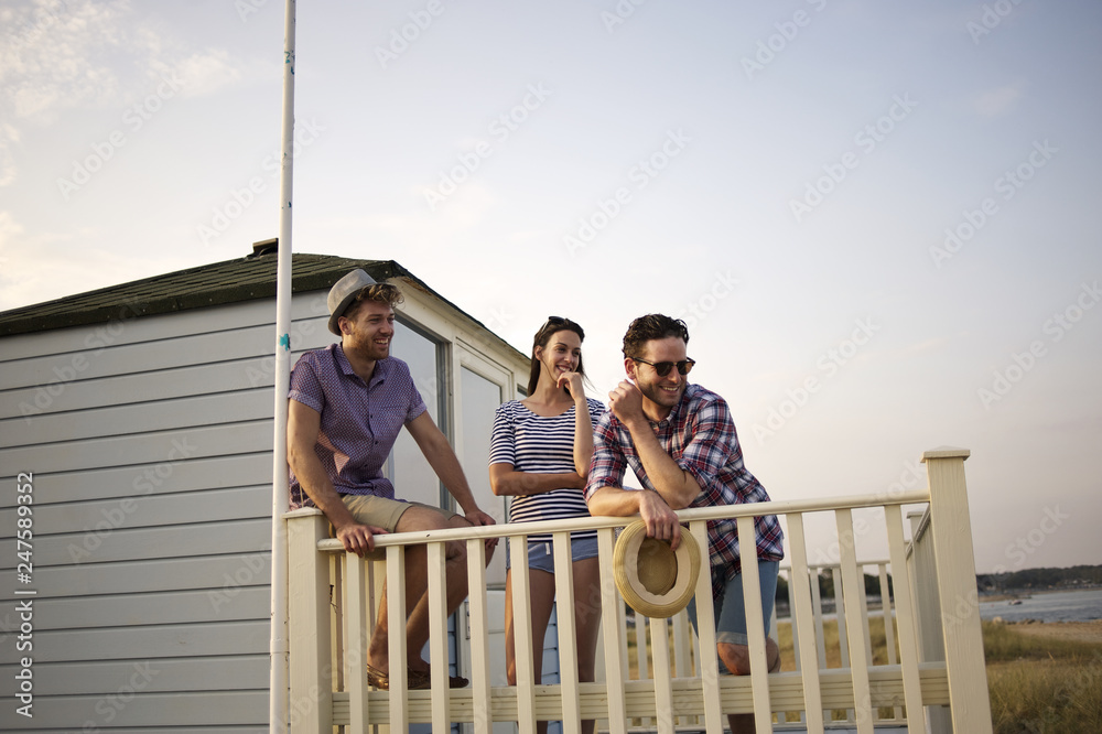 Group of friends evening at the beach Group of friends evening at the beach