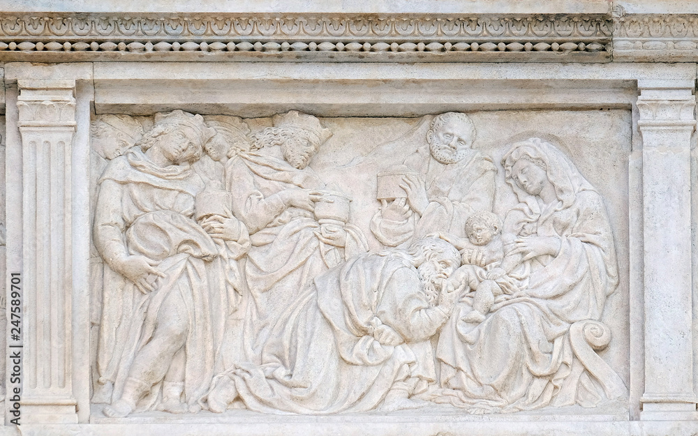 Nativity Scene, Adoration of the Magi, relief on portal of Saint Petronius Basilica in Bologna, Italy