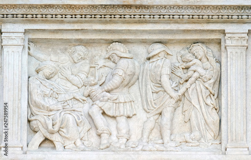 The Innocent massacre, relief on portal of Saint Petronius Basilica in Bologna, Italy