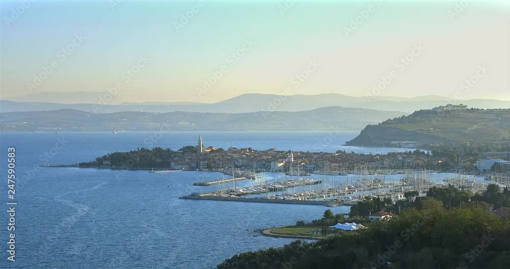 Aerial view of old fishing town Izola in Slovenia. Adriatic sea coast, peninsula of Istria, Europe. Aerial view of old fishing town Izola in Slovenia. Adriatic sea coast, peninsula of Istria, Europe.