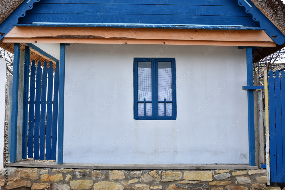 Obraz premium House outdoor decoration in Jurilovca village ,an important fishing center in Danube Delta area and tourists attraction in Tulcea, Romania