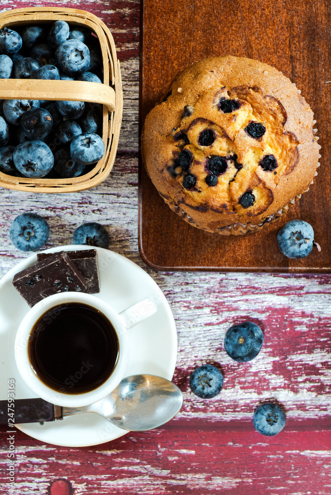 Blueberry muffin and coffee