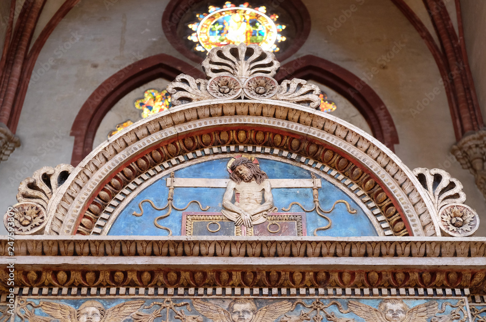 Symbols of the Passion in a lunette, San Petronio Basilica in Bologna, Italy