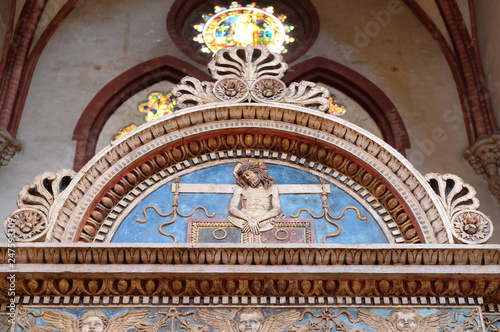 Symbols of the Passion in a lunette  San Petronio Basilica in Bologna  Italy