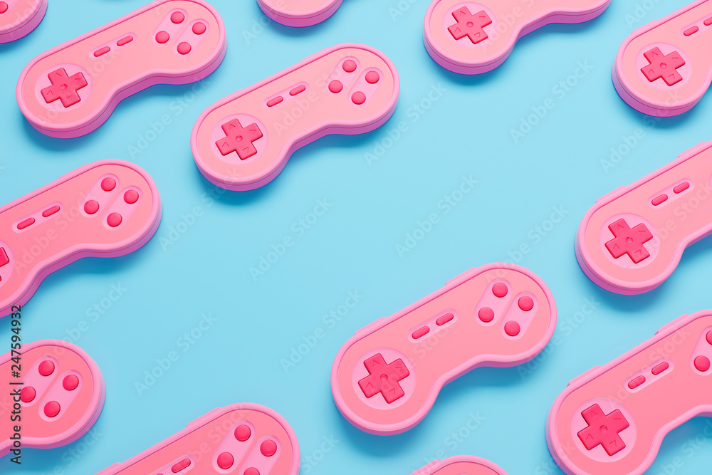 Background made of pink retro gamepad on the blue table. Top view. 3d render