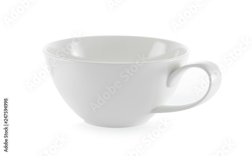 white ceramic cup on white background