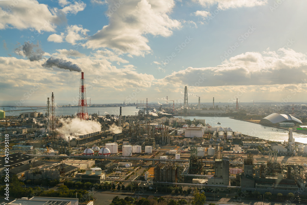 Oil refinery industrial and chemical factory plant with blue sky.