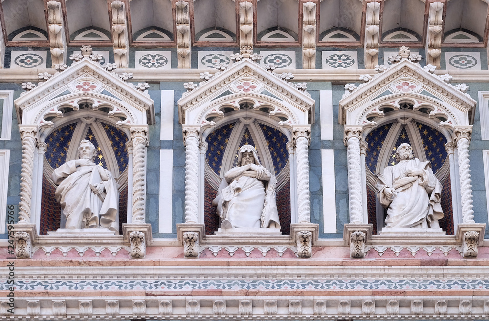 Statues of the Apostles and the fine architectural detail of the of the, Portal of Cattedrale di Santa Maria del Fiore (Cathedral of Saint Mary of the Flower), Florence, Italy