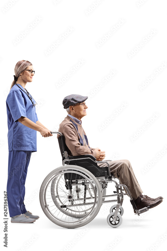 Nurse pushing a senior man in a wheelchair Nurse pushing a senior man in a wheelchair