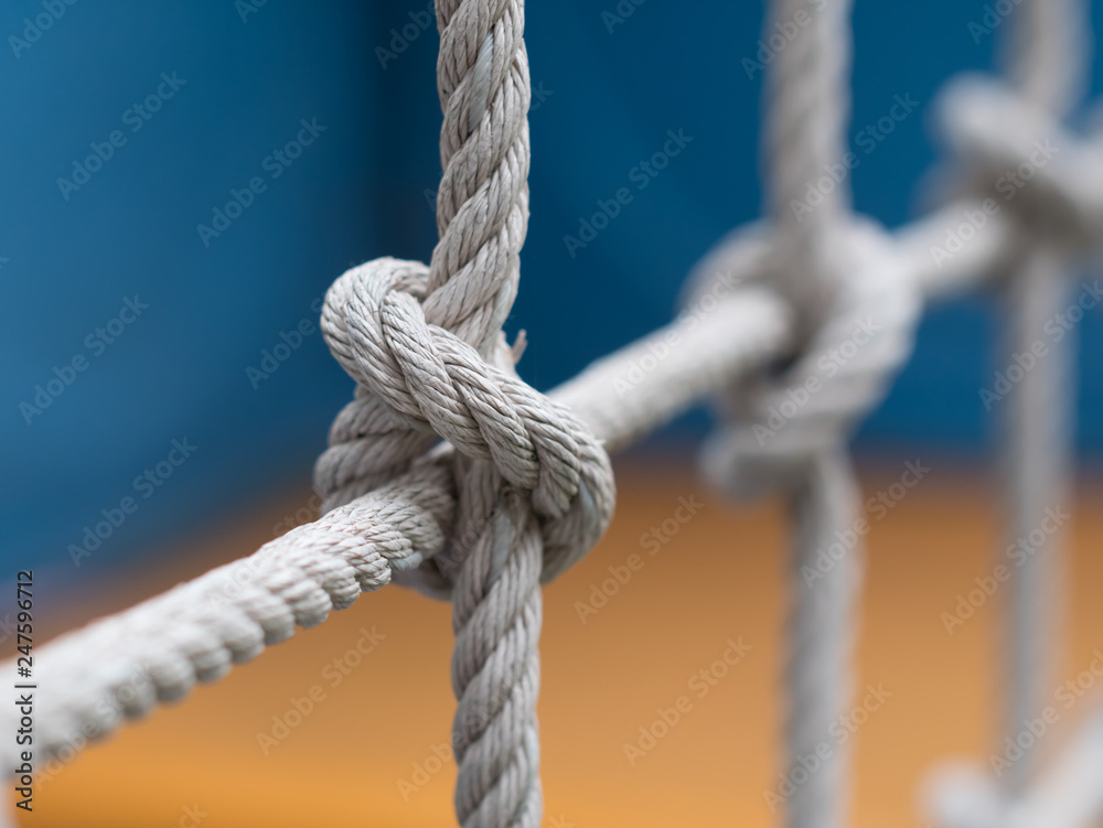 The old rope knot for net climbing, closeup of rope knot The old rope knot for net climbing, closeup of rope knot