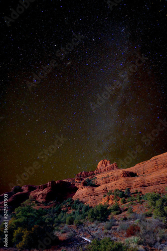 Steamboat Rock in the Milkyway. An HDR composite of Steamboat Rock in Sedona Arizona with the Milkyway in the night sky.