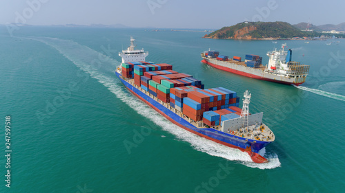 Aerial view container ship going to sea port for unload container. Logistic, import export, shipping or transportation.