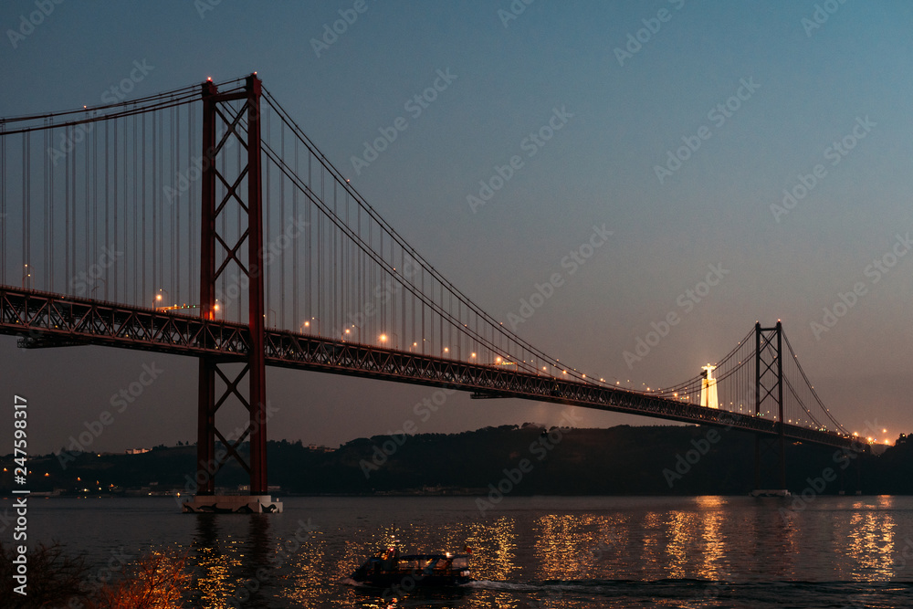 25 april bridge landscape and Christ the King in Lisbon, Portugal 25 april bridge landscape and Christ the King in Lisbon, Portugal