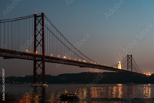 Fototapeta Naklejka Na Ścianę i Meble -  25 april bridge landscape and Christ the King in Lisbon, Portugal