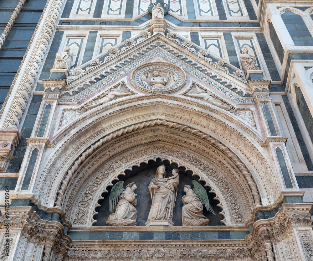 Portal on the side-wall of Cattedrale di Santa Maria del Fiore (Cathedral of Saint Mary of the Flower), Florence, Italy 