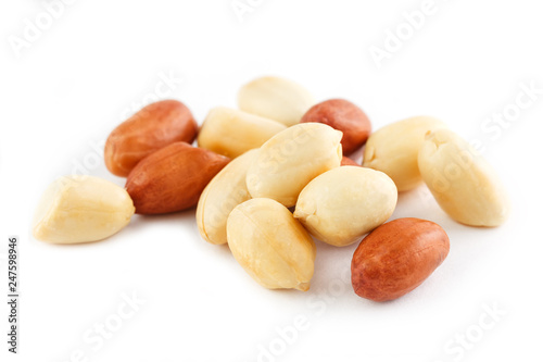 Peanuts isolated on white background. Peeled Peel and Scarlup.
