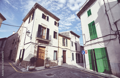 Street corner in Alcudia old town, color toning applied, Mallorca, Spain. © MaciejBledowski