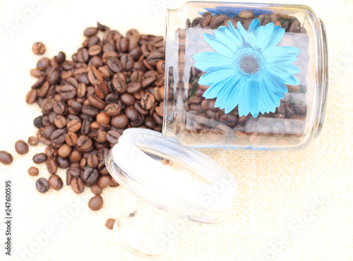 coffee beans and glass jar close up