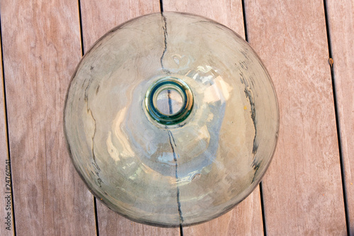 Green demijohn upside view
