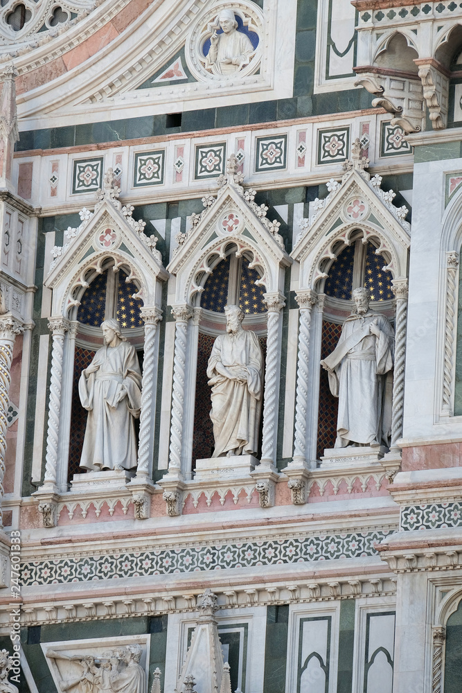 Statues of the Apostles and the fine architectural detail of the of the, Portal of Cattedrale di Santa Maria del Fiore (Cathedral of Saint Mary of the Flower), Florence, Italy 
