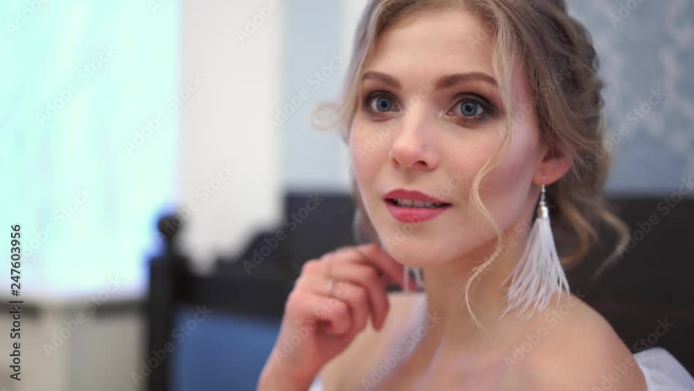 beautiful blonde bride poses closeup in a chic rich indoor beautiful blonde bride poses closeup in a chic rich indoor