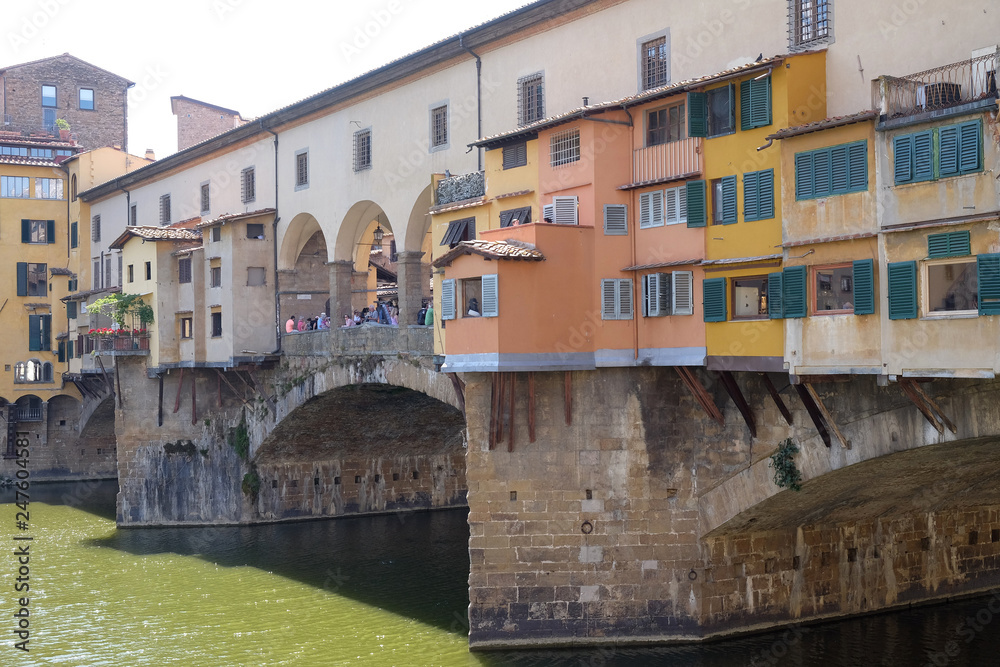Medieval stone bridge Ponte Vecchio and the Arno Rive in Florence, Tuscany, Italy