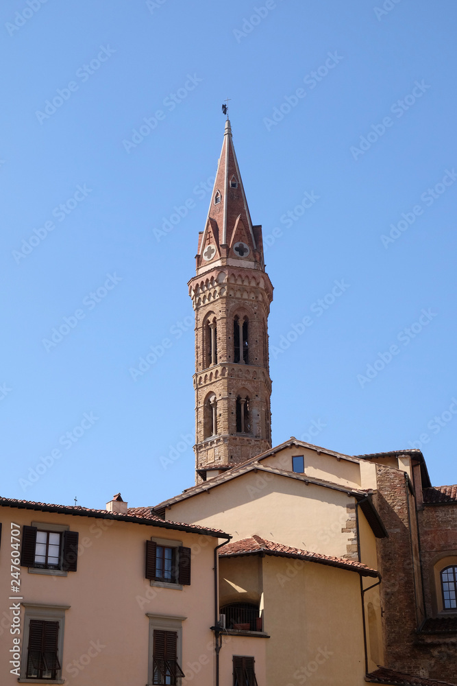 Bell tower of the Badia Fiorentina church view from the Piazza San Firenze at historic center of Florence, Tuscany, Italy