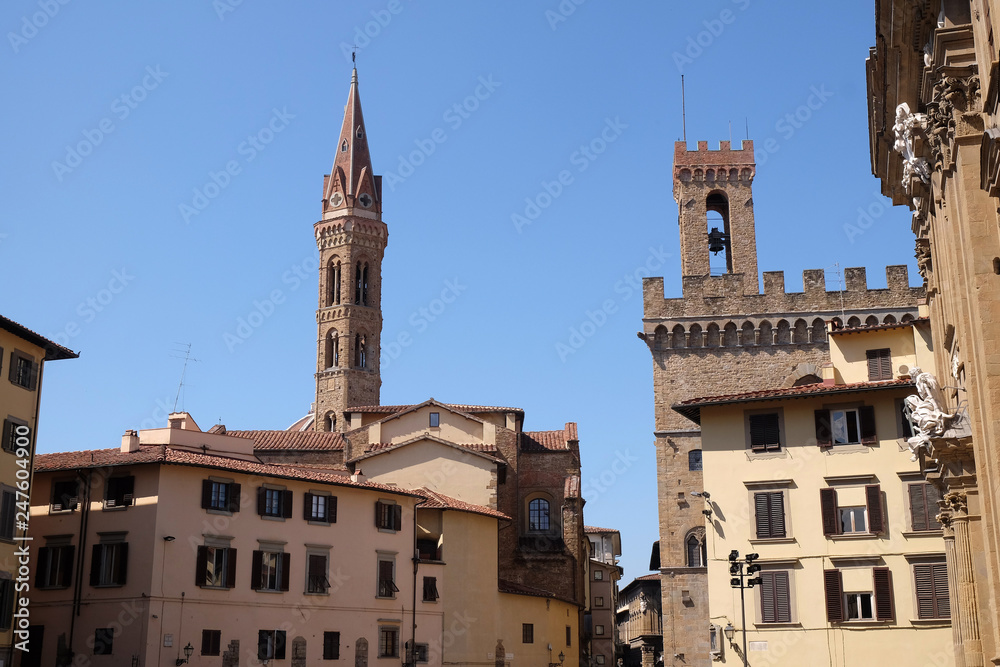 Bell tower of the Badia Fiorentina church view from the Piazza San Firenze at historic center of Florence, Tuscany, Italy