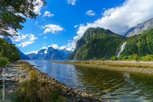big waterfall at milford sound, fiordland, new zealand 33
