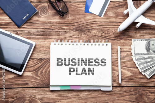 Text Business Plan on notepad. Business concept