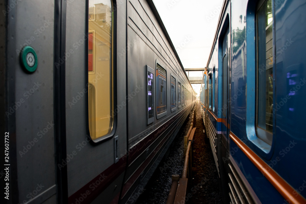 Abstract image of two train  side by side with rail 
