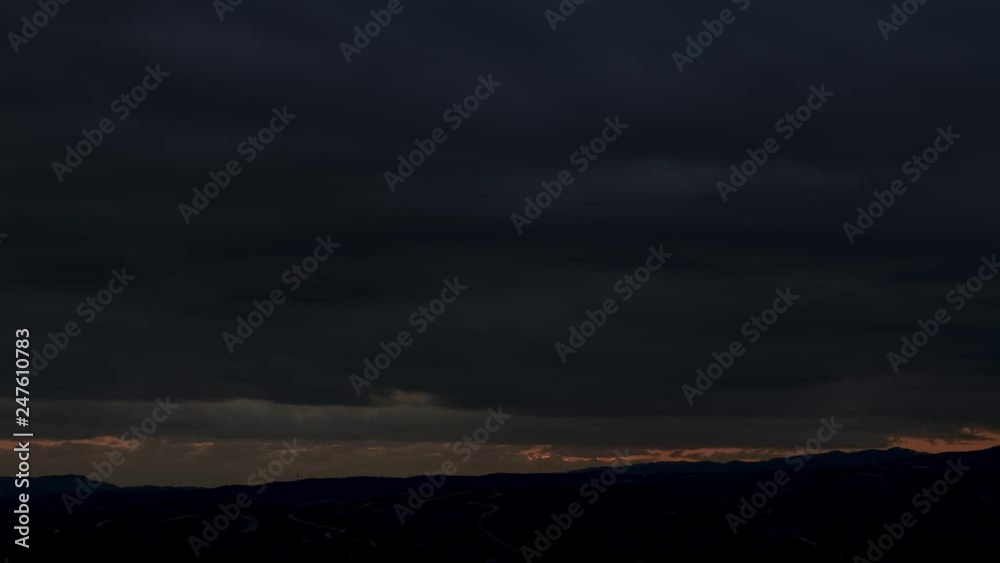 Dramatic sunset light rays over the horizon timelapse Dramatic sunset light rays over the horizon timelapse