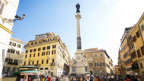 Photography Virgin Mary statue, Colonna dell immacolata, on column in Piazza di Spagna in Ro