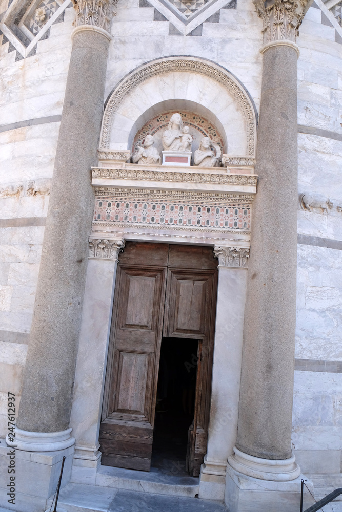 Entrance door of the Leaning Tower of Cathedral in Pisa, Italy. Unesco World Heritage Site