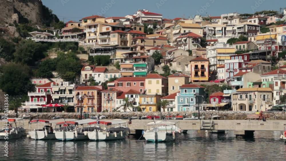Parga harbour and jetty with town in the background, Greece Parga harbour and jetty with town in the background, Greece