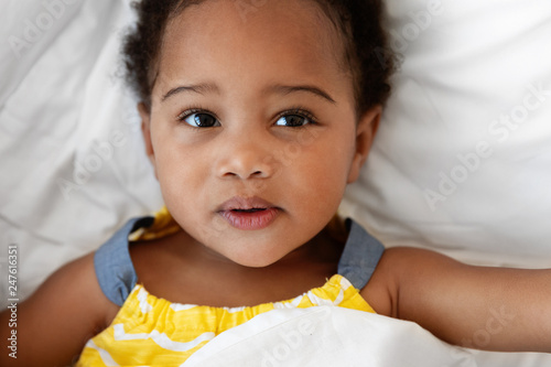 Close up of dark skin toddler girl