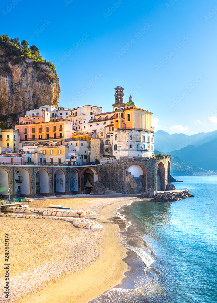 Morning view of Amalfi cityscape on coast line of mediterranean sea, Italy