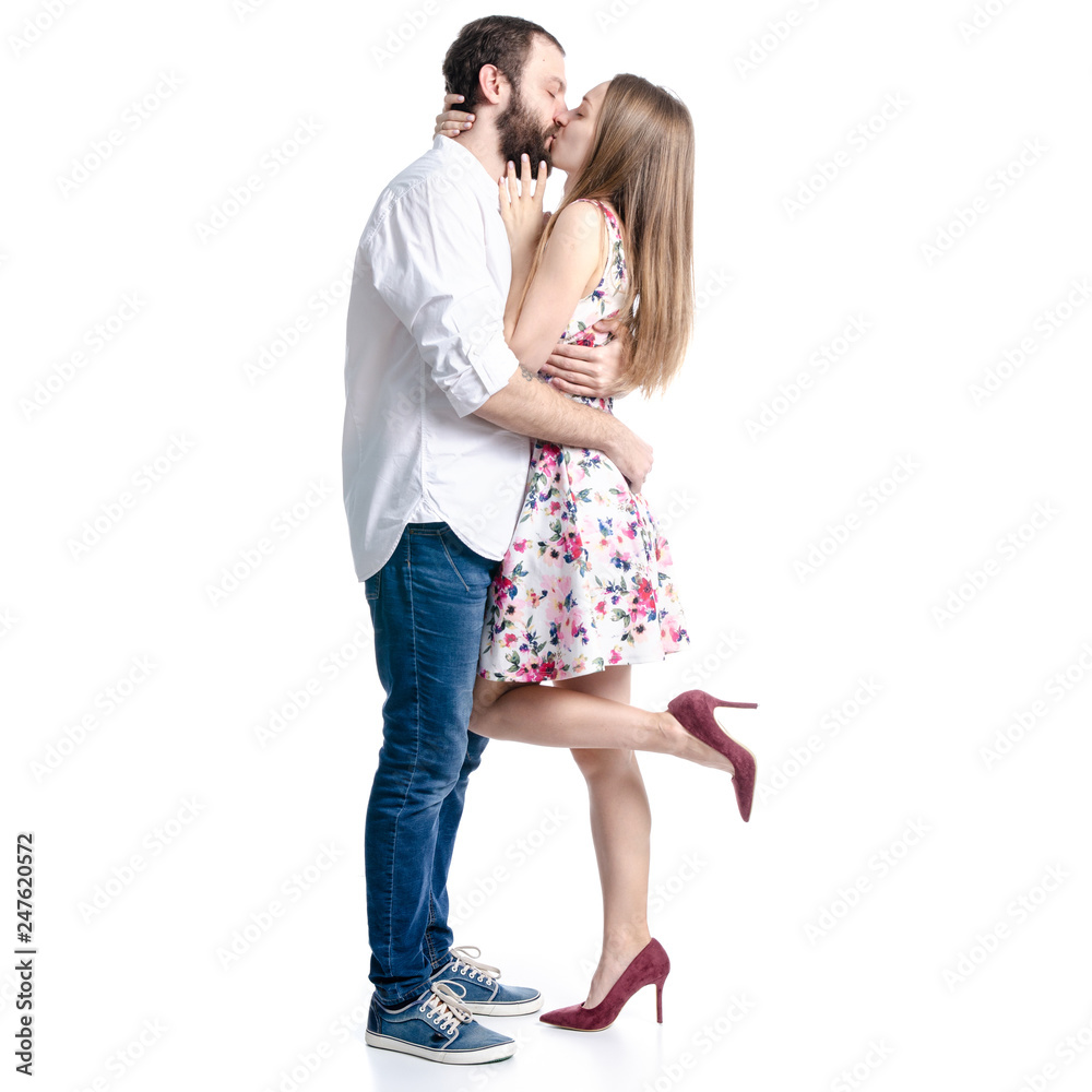 Man with woman young couple kissing hug on white background isolation