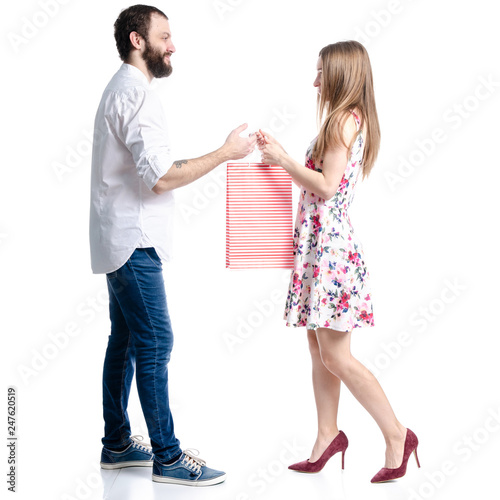 Man with woman young couple package bag in hand gift on white background isolation