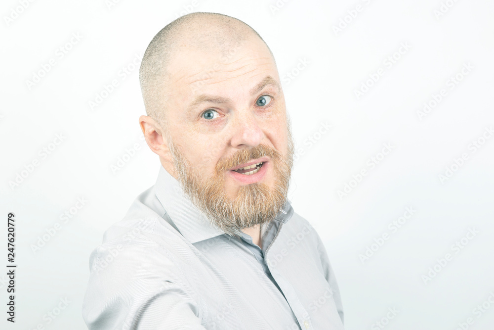 portrait of a bearded man on a light background portrait of a bearded man on a light background