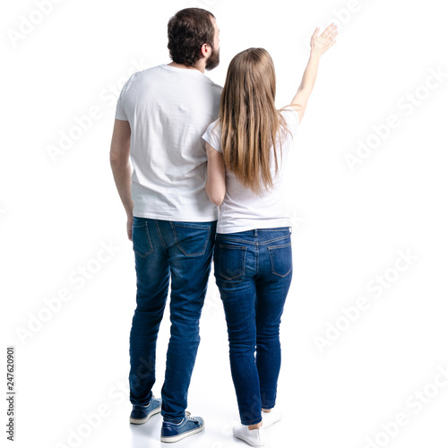 Young couple woman man pointing showing on white background isolation, back view