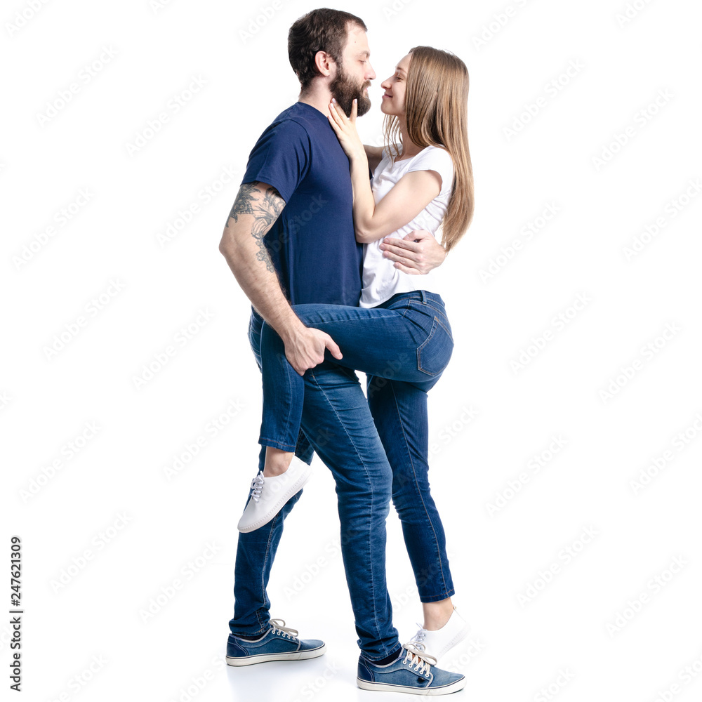 Man and woman couple hug kissing on white background isolation Man and woman couple hug kissing on white background isolation